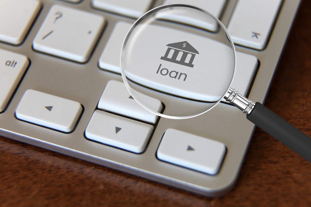 button on computer that reads "loan"