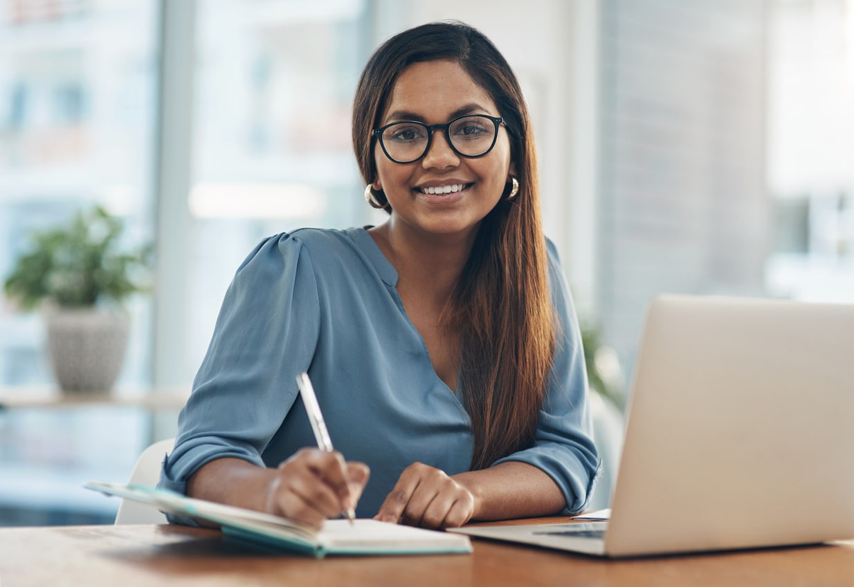 Woman smiling while working from home
